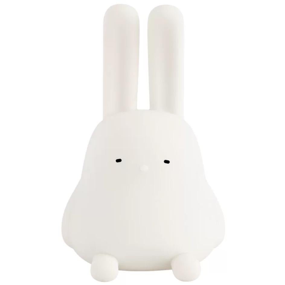 Adorable foldable ear bunny night light with soft silicone body, warm LED glow, tap control, phone stand & hanging function. Rechargeable & portable.